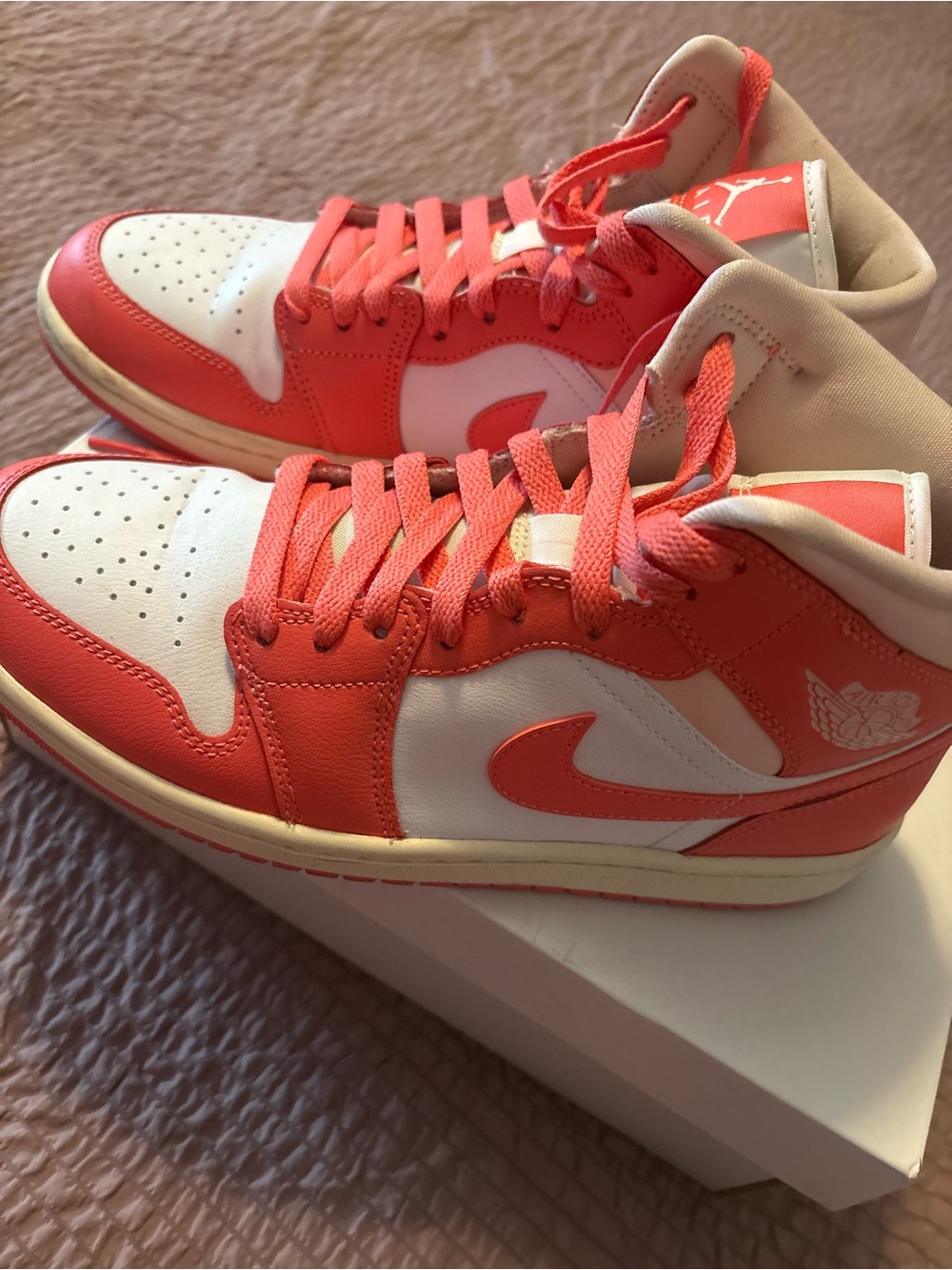 Jordan Women’s Mid-Top Athletic Shoes in Coral and White